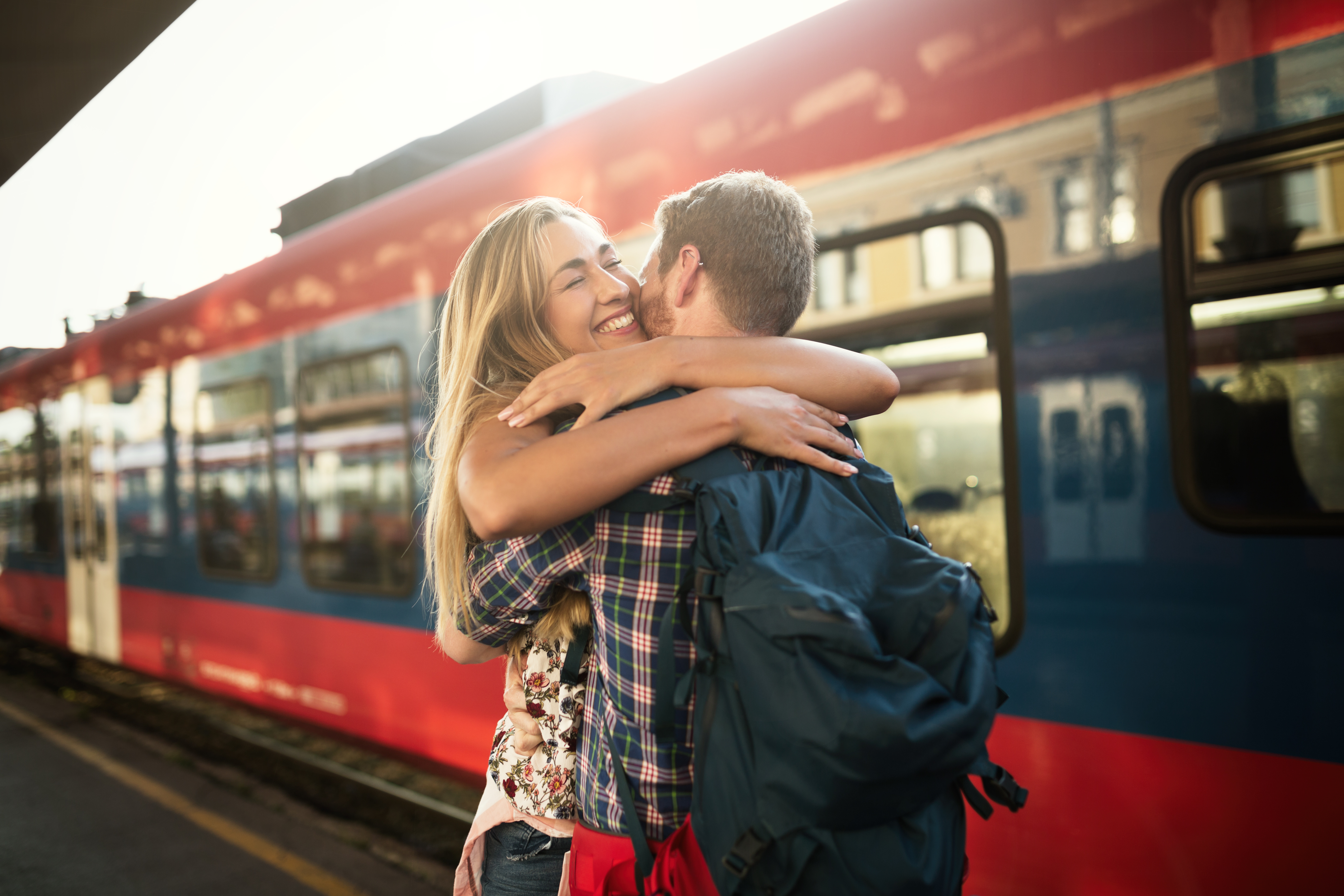 Beautiful couple hugging after long separation