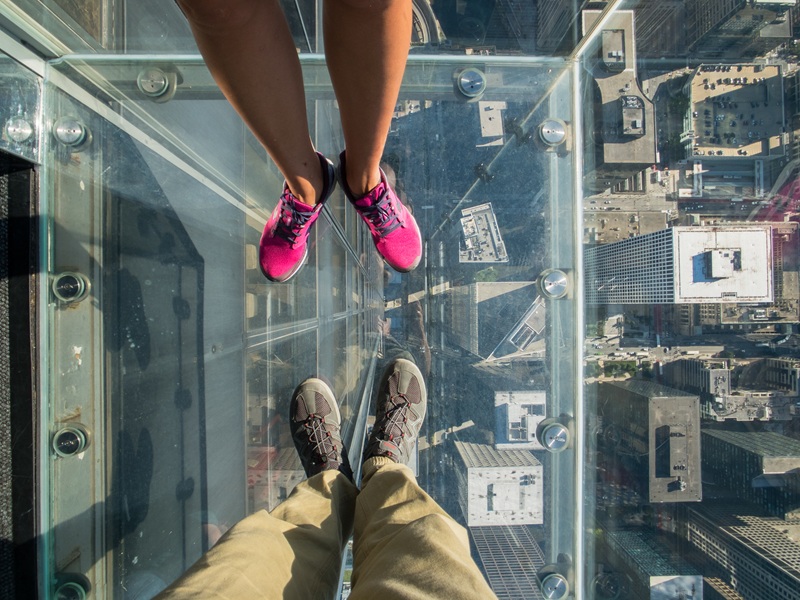 Willis Tower Chicago, tourists standing on glass deck